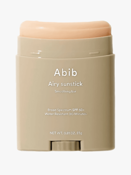 Abib Airy Sunstick in branded twist up component on a light gray background